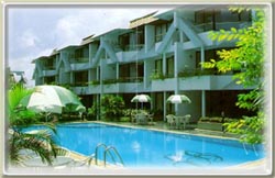 apartment surrounding swimming pool